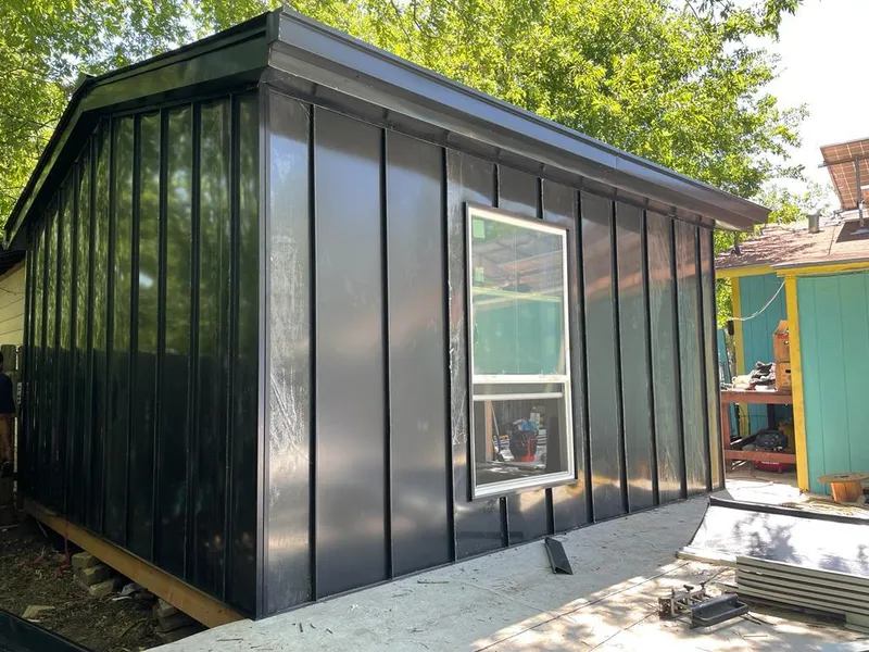 Black standing seam metal wall panels for Metal Roof Installation in Stoughton