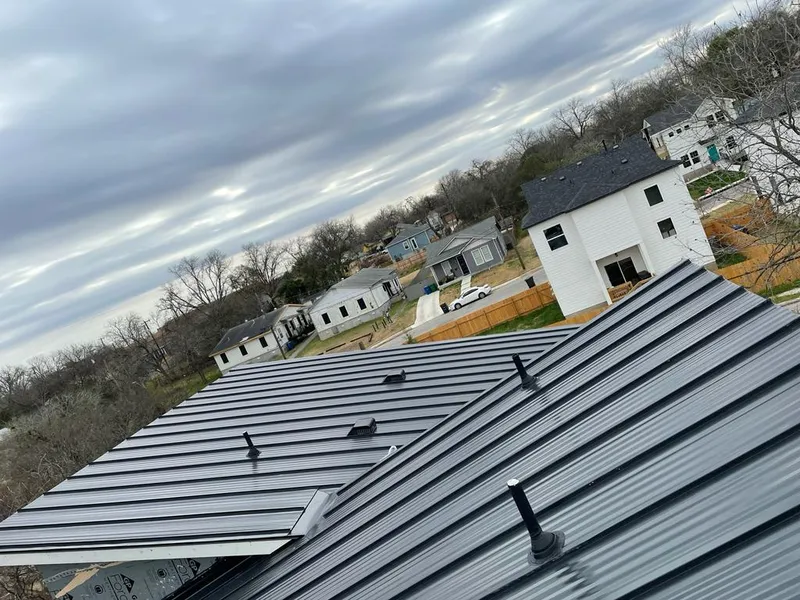 Standing seam metal roof panels with vents for Skylight Repair in Stoughton
